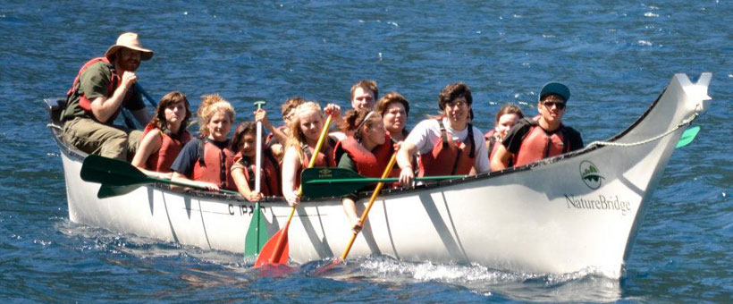Students boating on Lake Crescent with Nature Bridge