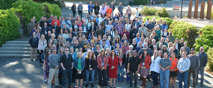 Faculty and staff in the courtyard