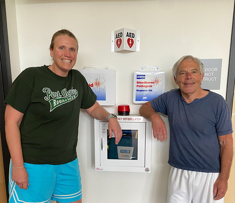 Allison Mahaney and Mike Aldrich pictured with AED