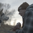 Rob Grabow and husky Yupik on Year of the Dog film set